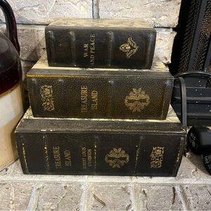 Stacking boxes with antique look of books.
